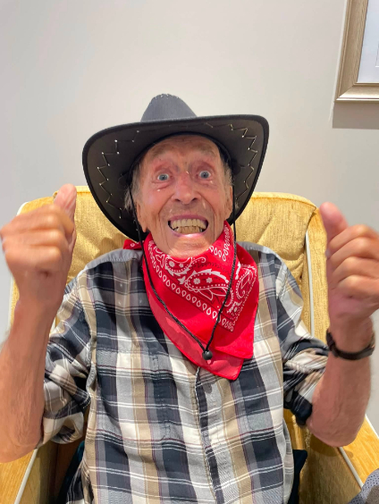 resident enjoying the Wild West Hoedown activity at the osprey court